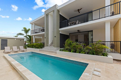 Ultime notizie aziendali su Progetto di ville nei Caraibi: migliorare la vita tropicale con ventilatori per soffitti in legno massello